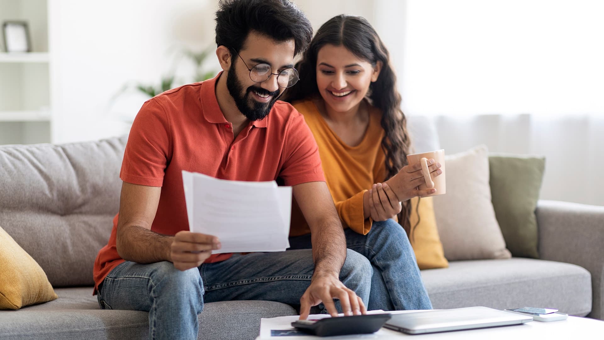 A couple looking at a computer screen