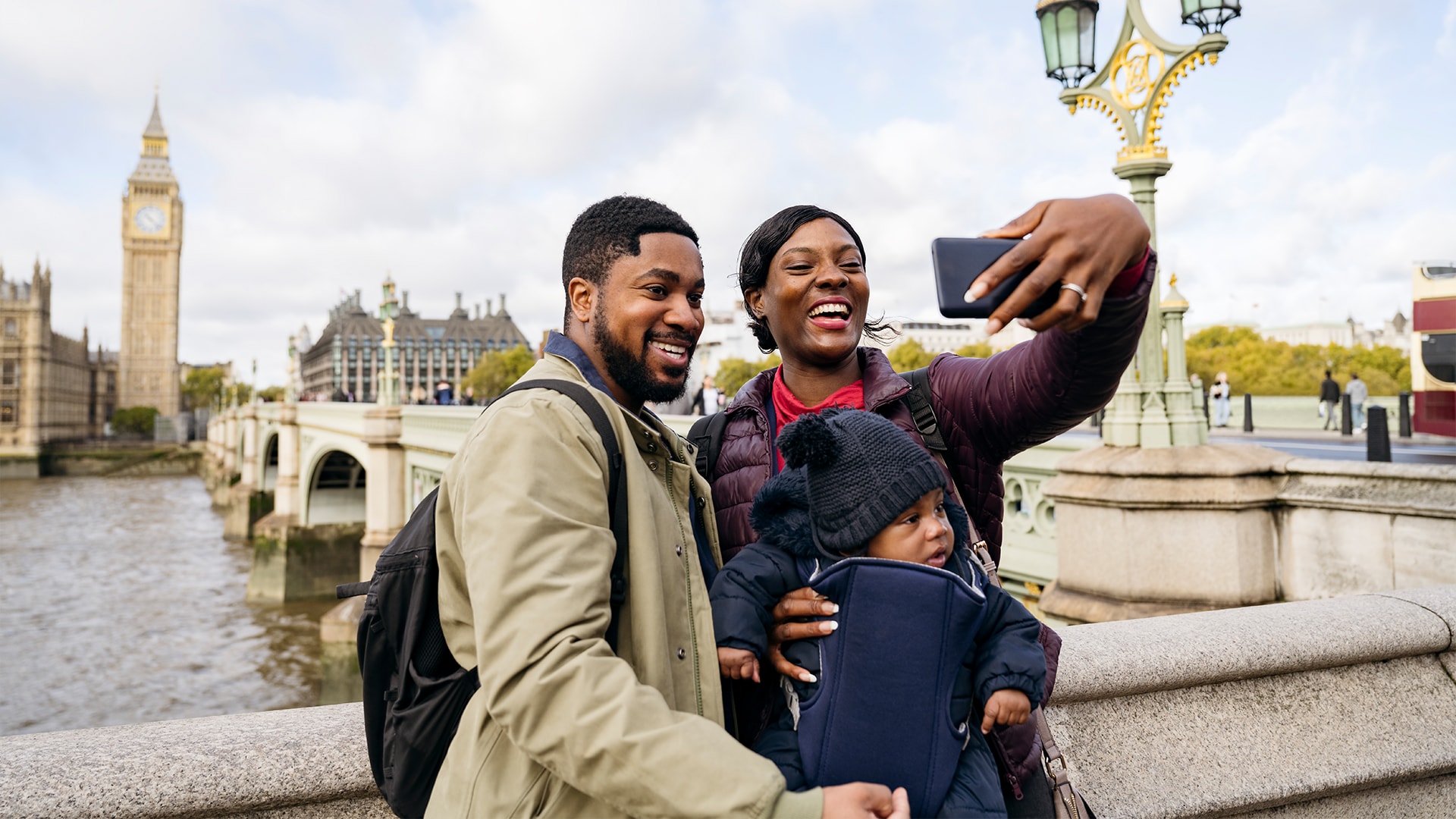 A family taking a selfie on vacation.