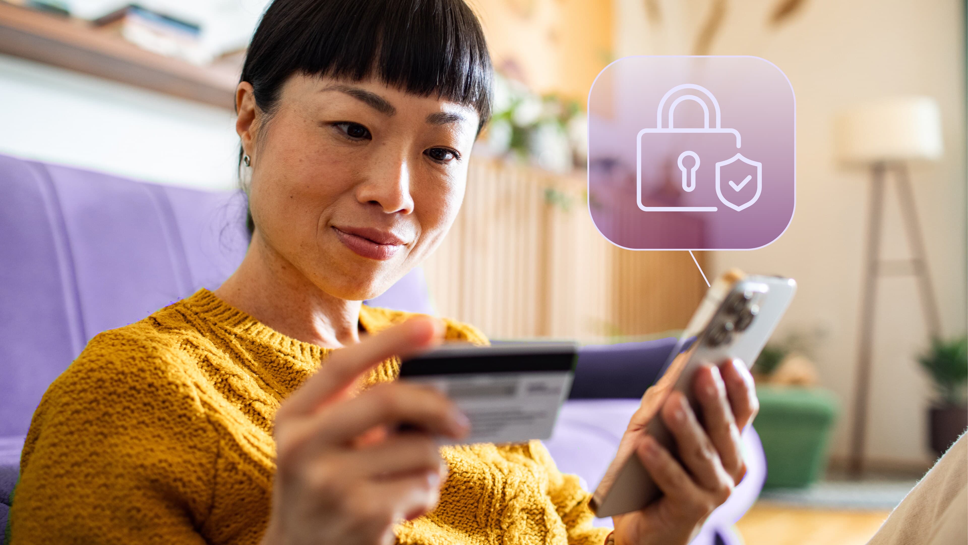 A person securely logging into their PC Financial® account on their phone next to a lock and checkmark icon.