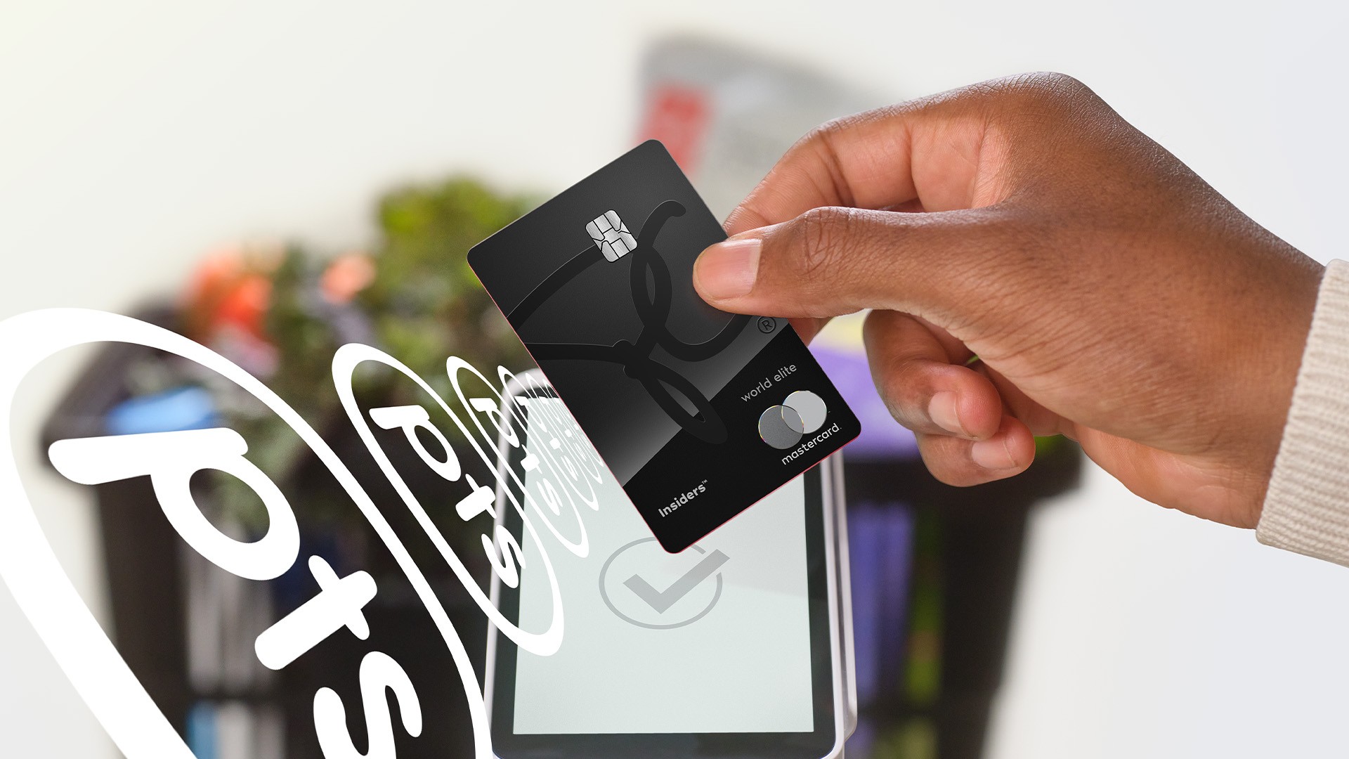 PC Mastercard tapping on a payment terminal