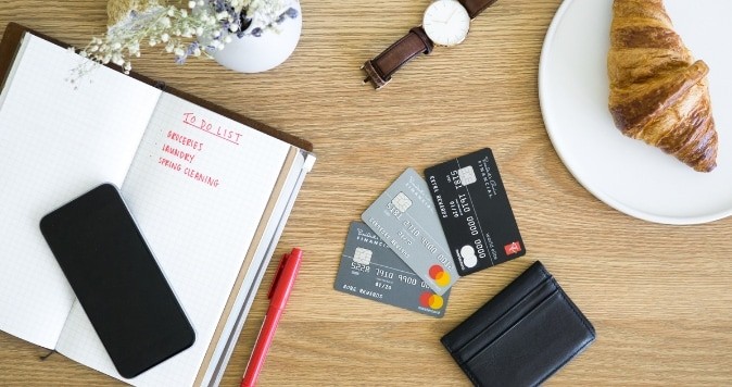 Desktop with notebook and PC Financial mastercards